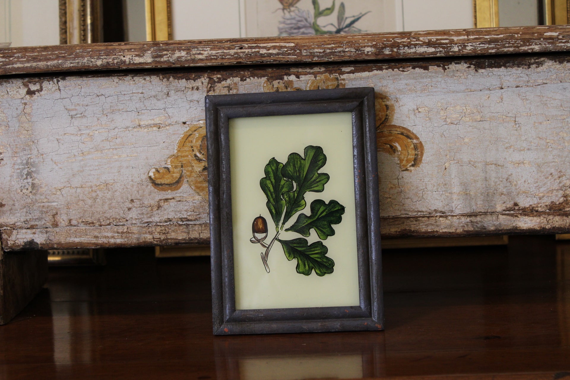 Vintage Reverse Glass Acorn with Oak Leaf in a Grey Reeded Frame