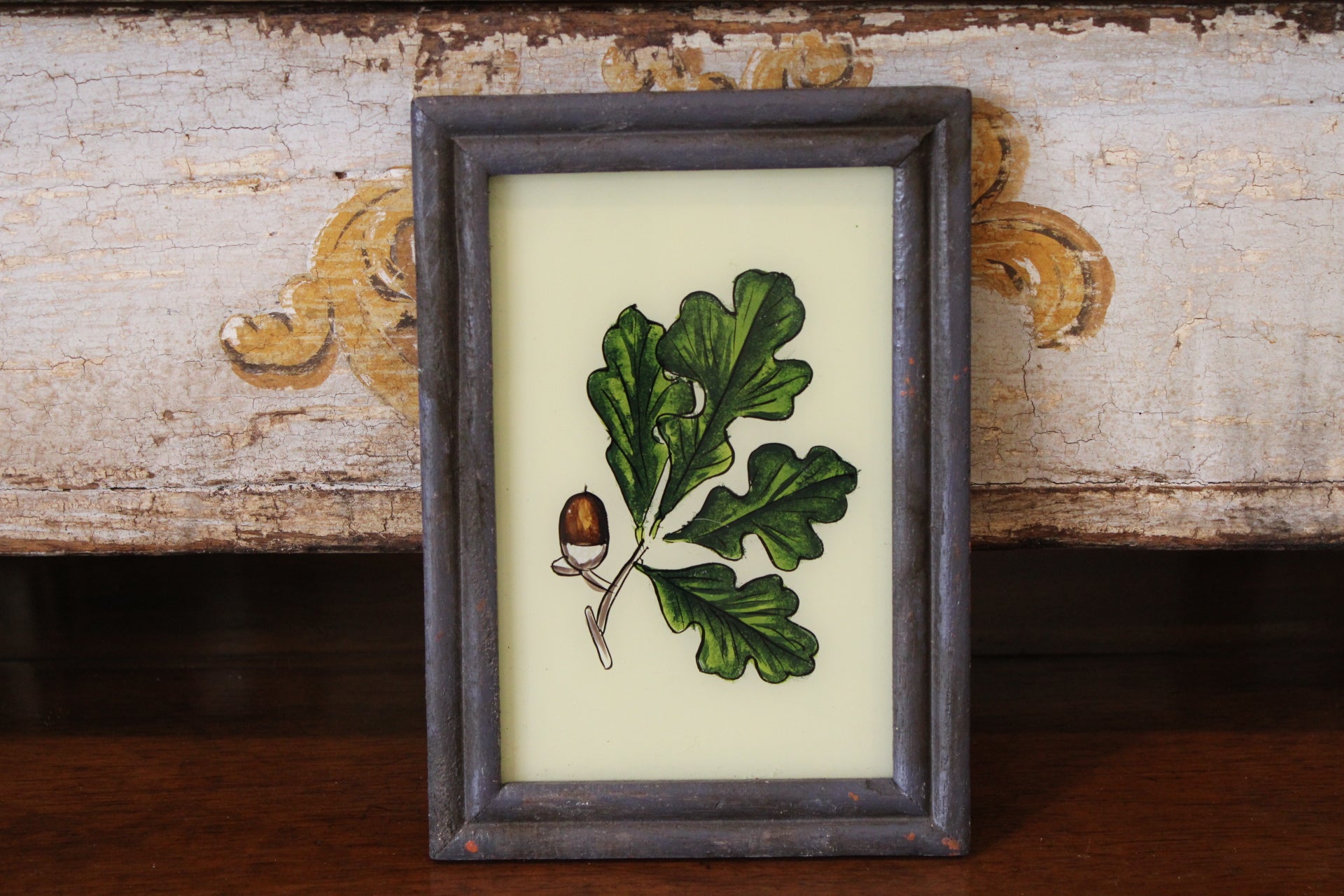Vintage Reverse Glass Acorn with Oak Leaf in a Grey Reeded Frame