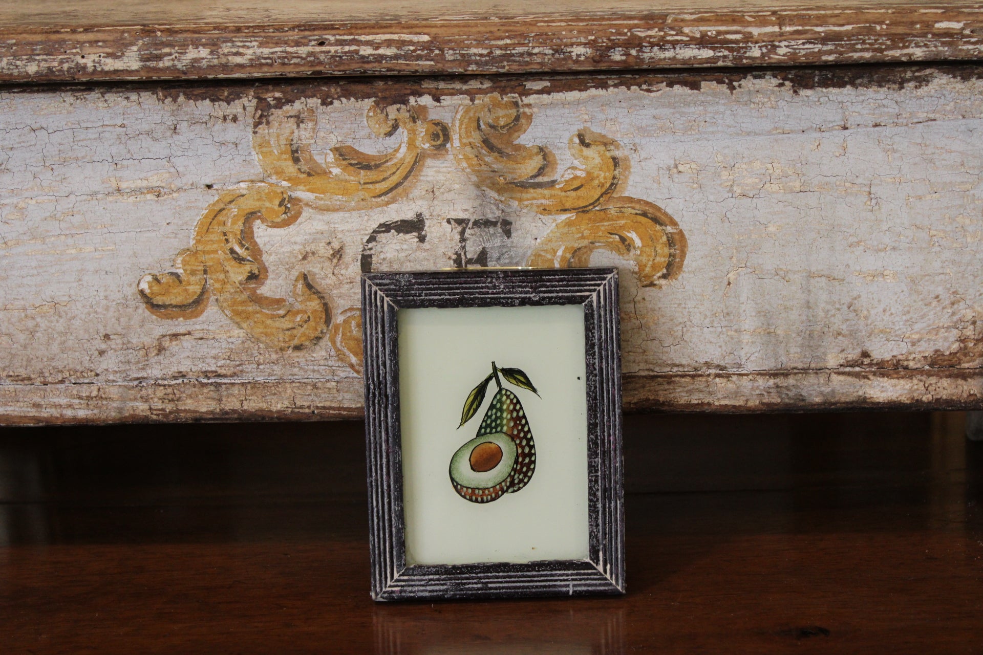Vintage Reverse Glass Avocado in a Dark Reeded Frame