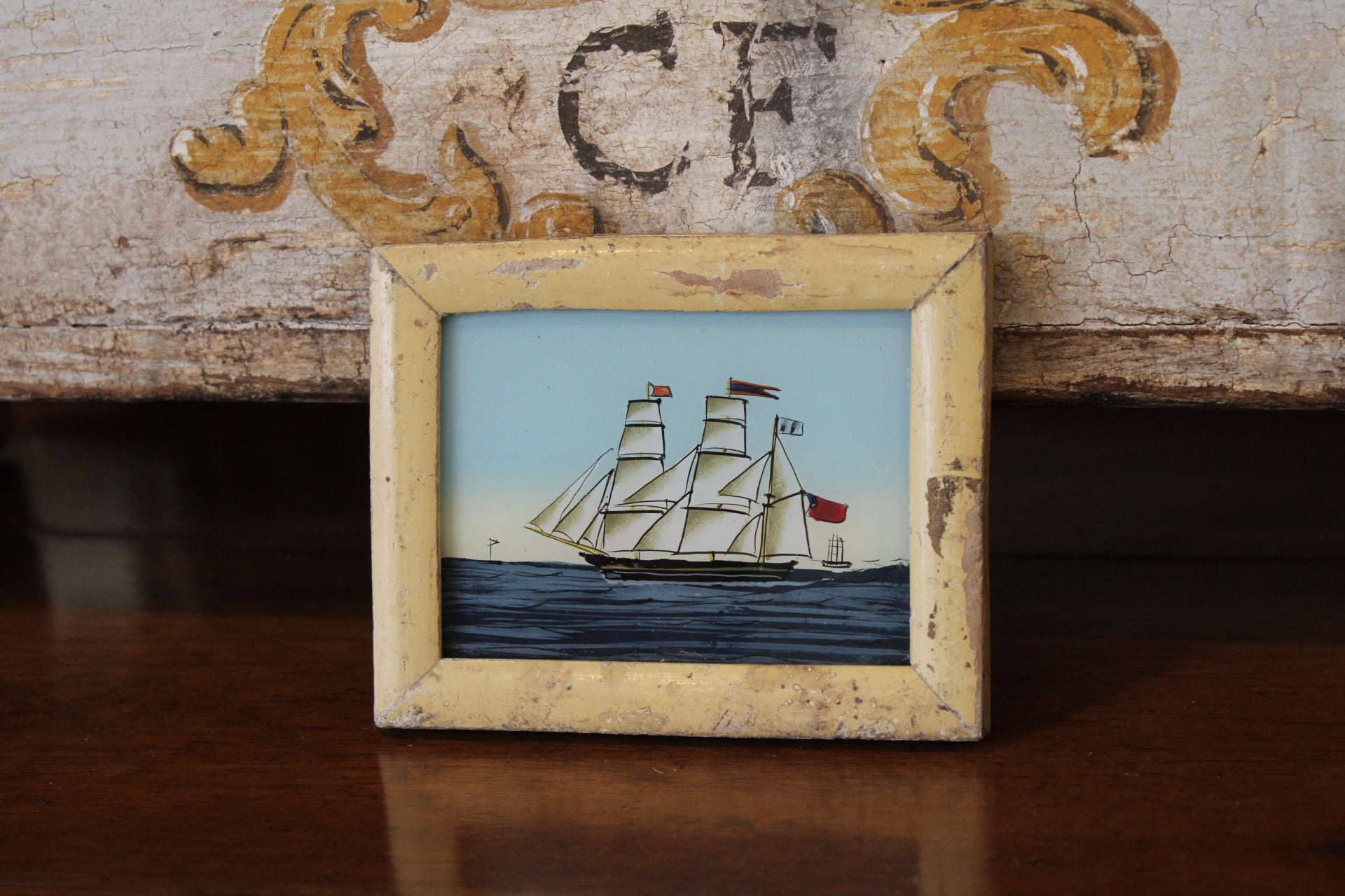 Vintage Reverse Glass Petite Ship in a Cream Reeded Frame